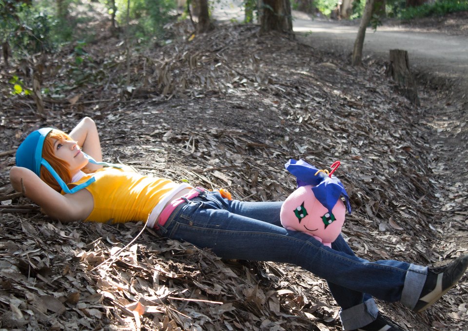 1girl cosplay_photo denim digimon digimon_adventure jeans pants photo_(medium) real_life stuffed_toy takenouchi_sora tree winrockbell