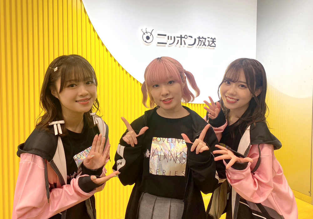 3girls date_sayuri emori_aya furihata_ai indoors jacket medium_hair multiple_girls open_clothes open_jacket photo_(medium) pink_hair smile standing