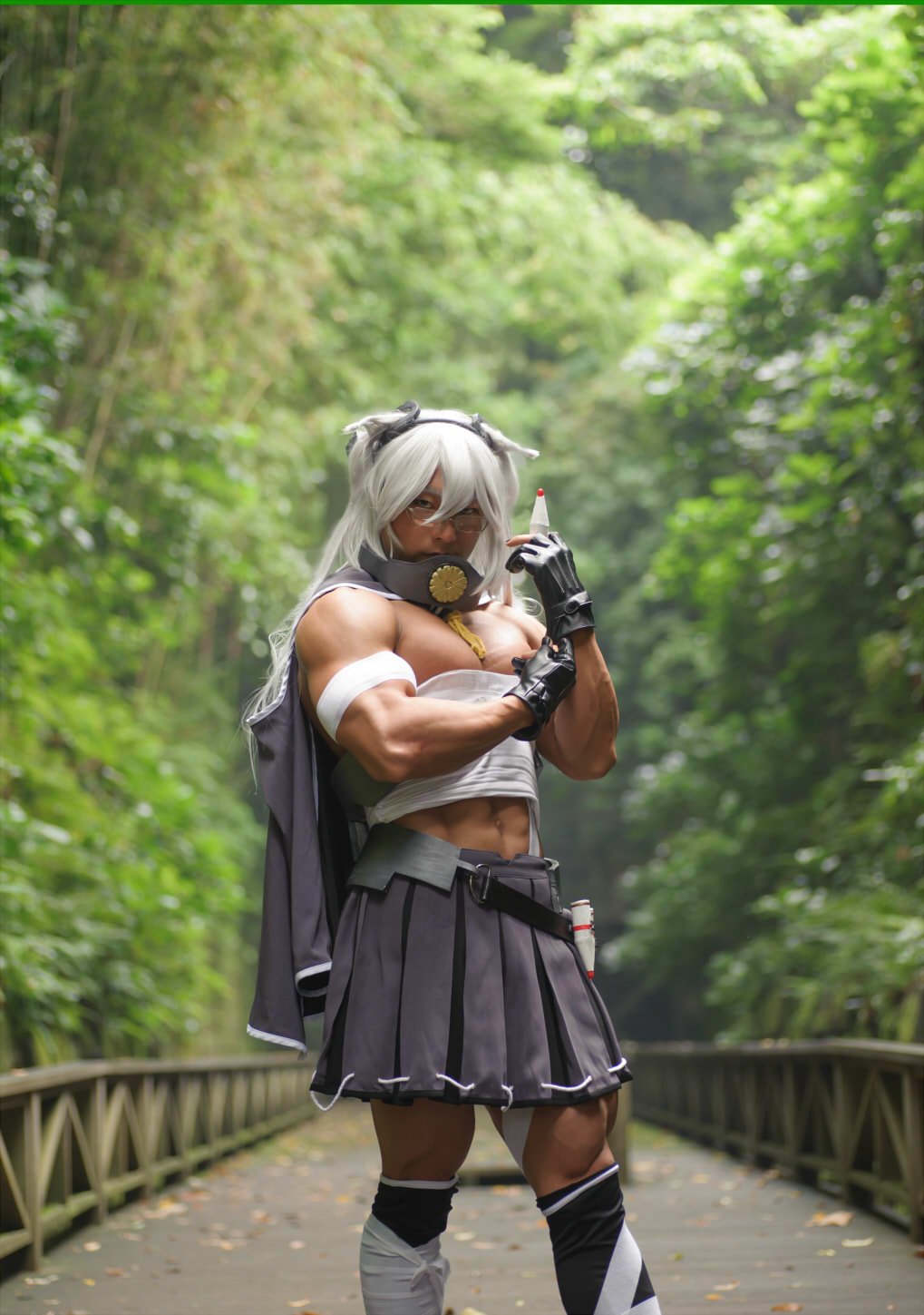 1boy abs black_gloves bridge cape collar commentary_request cosplay cosplay_photo costume_switch crossdressing crossdressing_(mtf) dark-skinned_male dark_skin day forest full_body glasses gloves hair_between_eyes headgear highres kantai_collection kneehighs long_hair looking_at_viewer male_focus manly musashi_(kancolle) musashi_(kancolle)_(cosplay) musashi_kai_(kancolle) muscular nature navel outdoors partially_fingerless_gloves pectorals photo_(medium) pleated_skirt ribbon-trimmed_skirt ribbon_trim sarashi semi-rimless_eyewear shigeru_(shigel_marv) silver_hair skirt socks solo two_side_up
