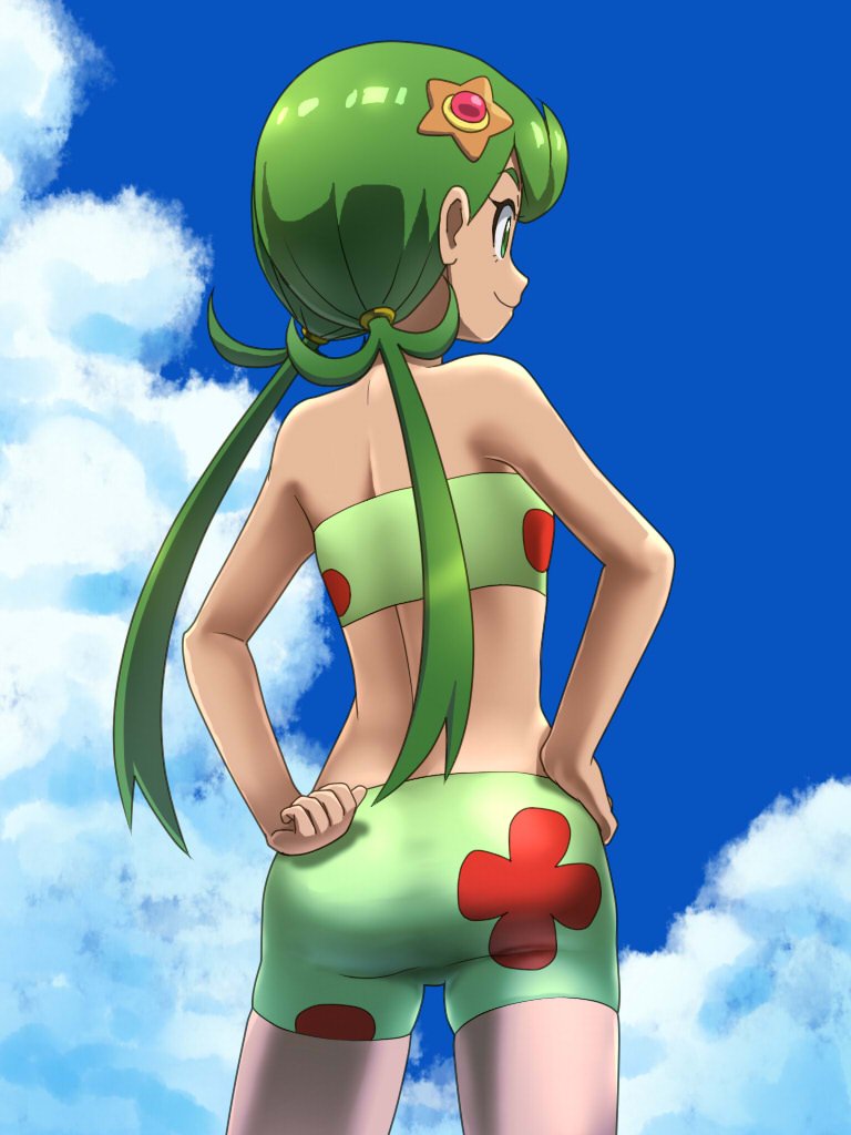 1girl awa bandeau bike_shorts character_hair_ornament closed_mouth cloud commentary_request day from_behind green_bandeau green_hair hair_ornament hands_on_own_hips happy long_hair mallow_(pokemon) nintendo outdoors pokemon pokemon_(anime) pokemon_sm_(anime) shoulder_blades sky smile solo twintails