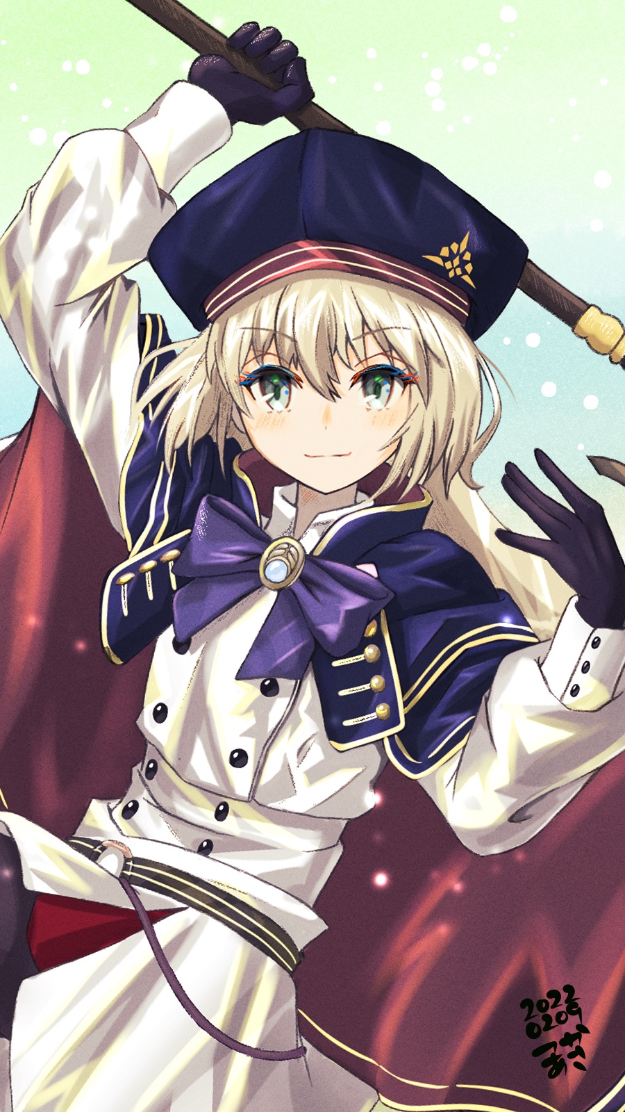 1girl aqua_eyes artoria_caster_(fate) artoria_caster_(second_ascension)_(fate) artoria_pendragon_(fate) black_gloves blonde_hair blue_bow blue_cape blue_hat blush bow buttons cape closed_mouth coat double-breasted fate/grand_order fate_(series) gloves gold_trim hair_between_eyes hat highres holding long_sleeves looking_at_viewer red_cape short_hair smile solo tsukaasa two-tone_cape white_coat
