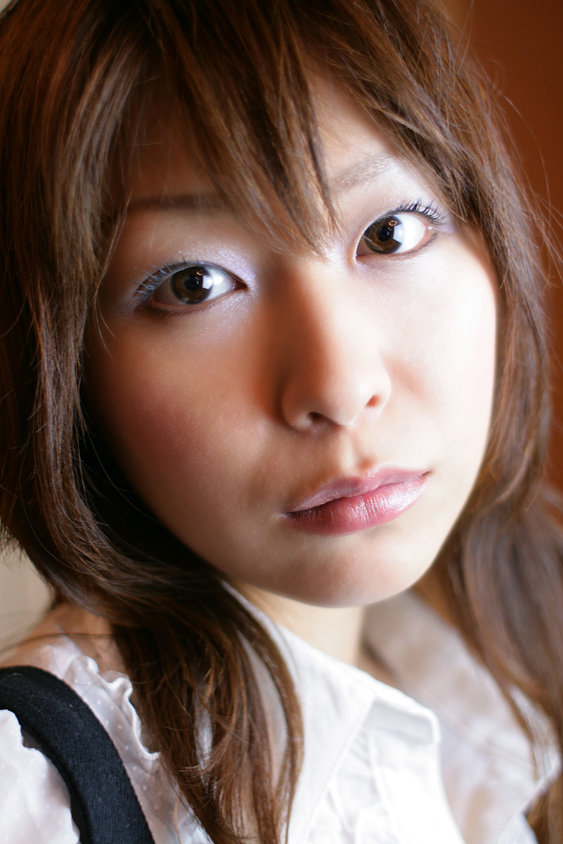 1girl blouse female_focus highres looking_at_viewer nao photo_(medium) shirt solo tagme