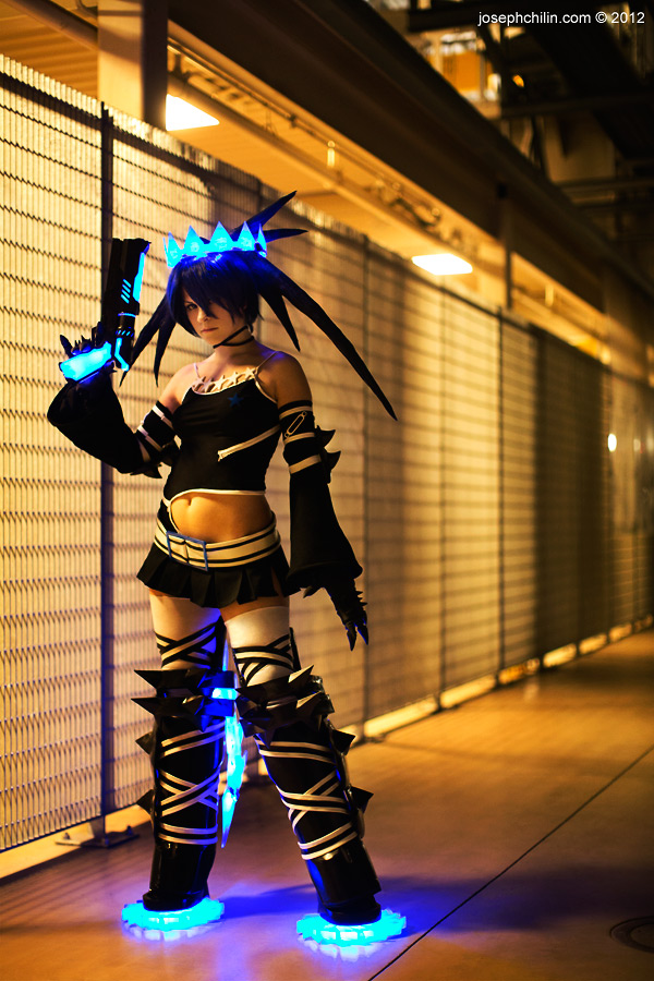 1girl arm_warmers black_hair black_rock_shooter black_rock_shooter_(character) black_rock_shooter_(character)_(cosplay) black_rock_shooter_beast black_rock_shooter_beast_(cosplay boots cosplay cosplay_photo glowing gun looking_at_viewer photo_(medium) real_life skirt thigh_boots thighhighs vensii weapon