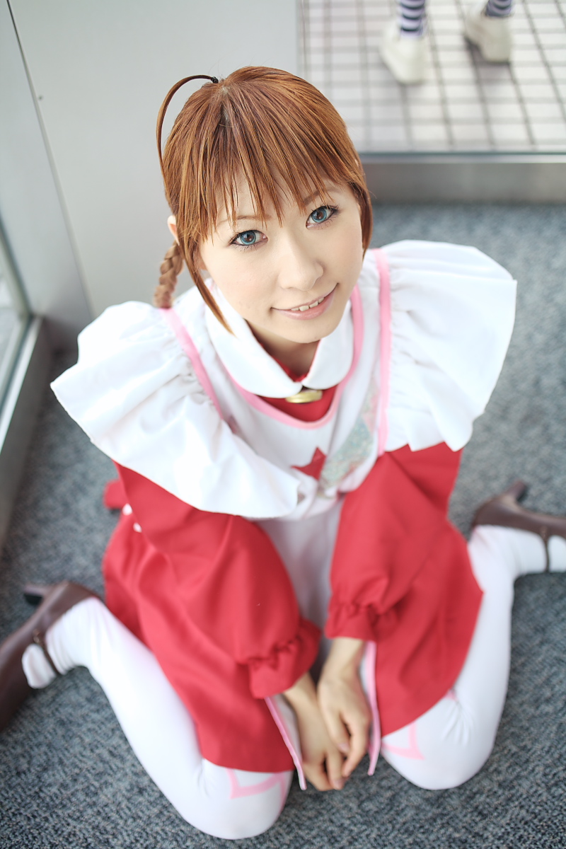 1girl ahoge apron arika_yumemiya arika_yumemiya_(cosplay) asian blue_eyes blurry braid chippi color_contacts cosplay depth_of_field female_focus highres indoors long_hair looking_at_viewer maid maid_apron my-otome photo_(medium) school_uniform sitting smile solo twin_braids wariza white_legwear