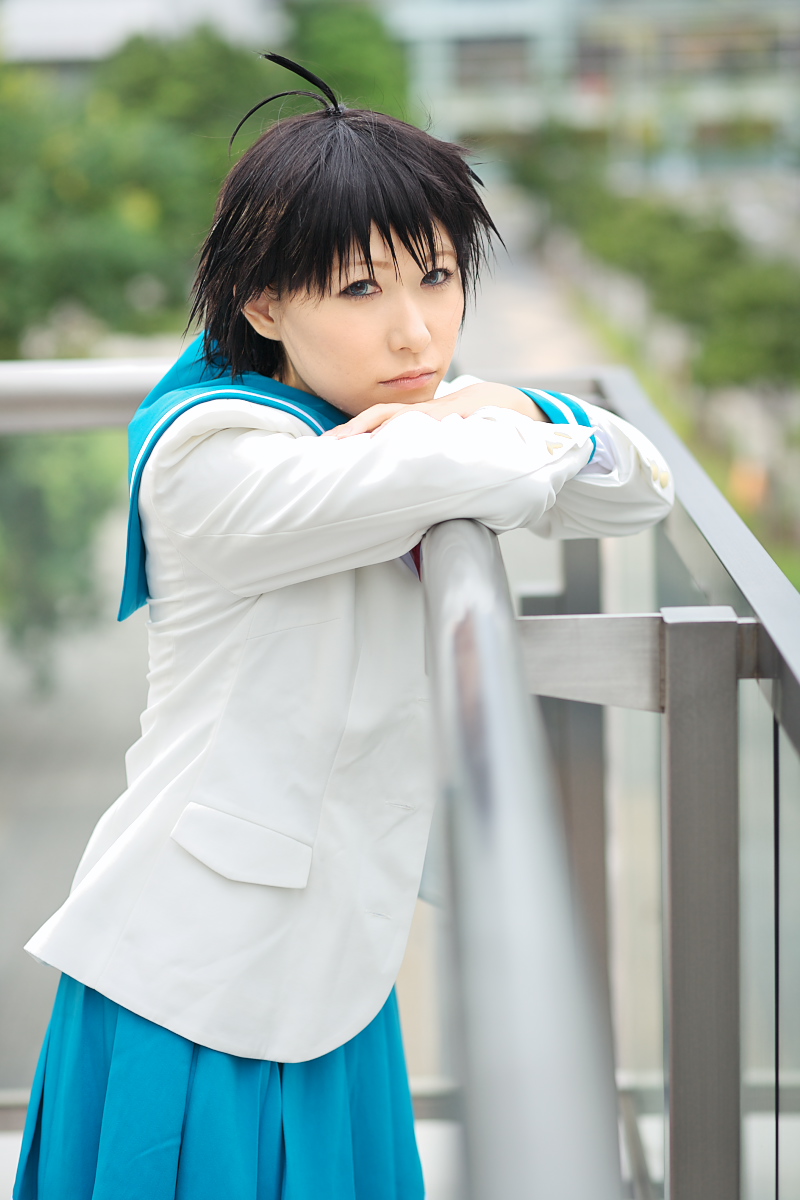1girl ahoge asian black_hair blue_eyes chippi color_contacts cosplay female_focus highres idolmaster idolmaster_xenoglossia kikuchi_makoto kikuchi_makoto_(cosplay) looking_at_viewer outdoors photo_(medium) school_uniform serafuku short_hair solo