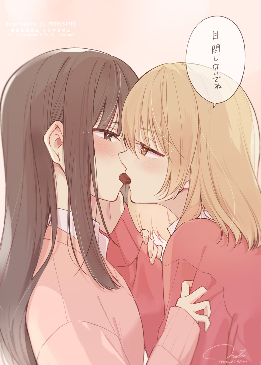 2girls blonde_hair blush brown_eyes brown_hair chocolate collared_shirt commentary hand_on_another&#039;s_face hazuki_natsu highres long_hair long_sleeves mouth_hold multiple_girls original pink_sweater sharing_food shirt sleeves_past_wrists speech_bubble sweater symbol-only_commentary translation_request watermark white_shirt yellow_eyes yuri