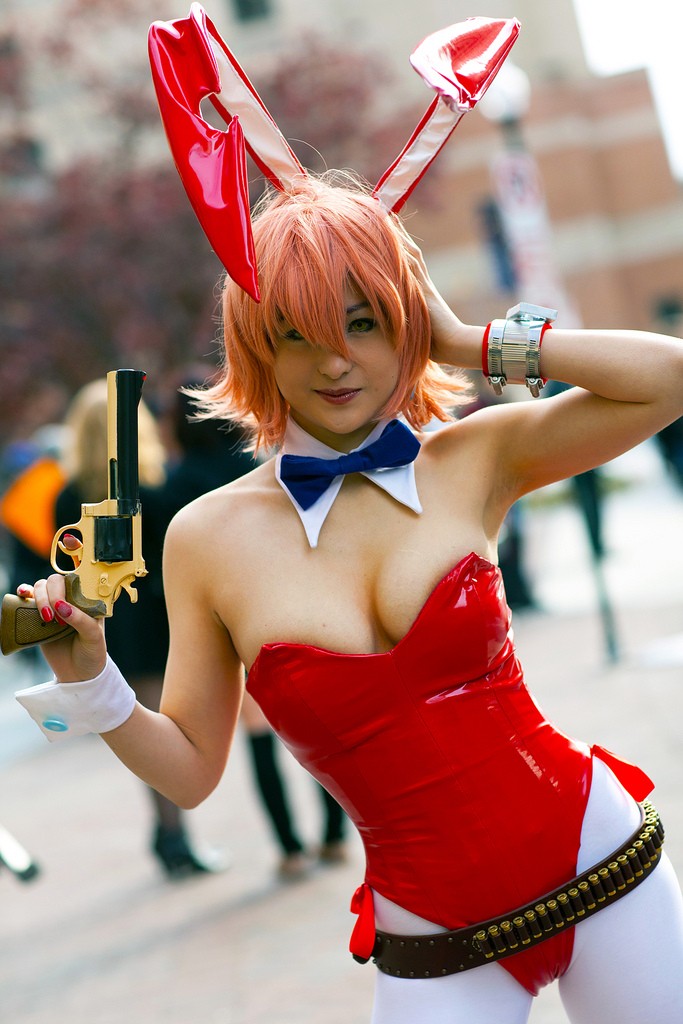 animal_ears armpits breasts cleavage cosplay fake_animal_ears flcl gun handgun haruhara_haruko haruhara_haruko_(cosplay) leotard photo_(medium) pink_hair playboy_bunny rabbit_ears revolver weapon