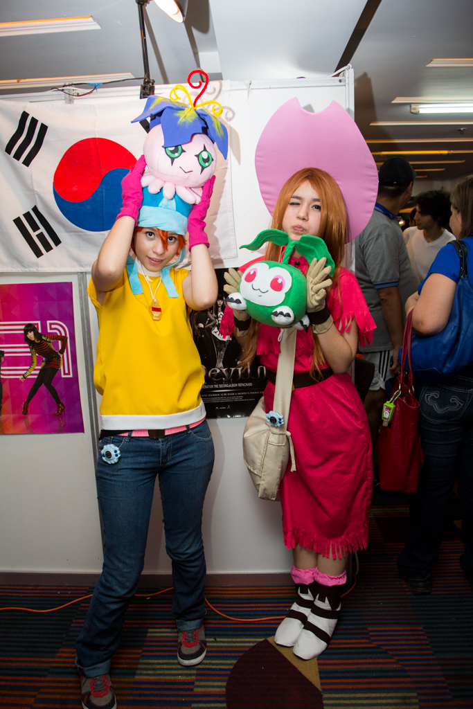 2girls cosplay_photo denim digimon digimon_adventure digivice dress jeans multiple_girls pants photo_(medium) real_life red_dress stuffed_toy tachikawa_mimi takenouchi_sora