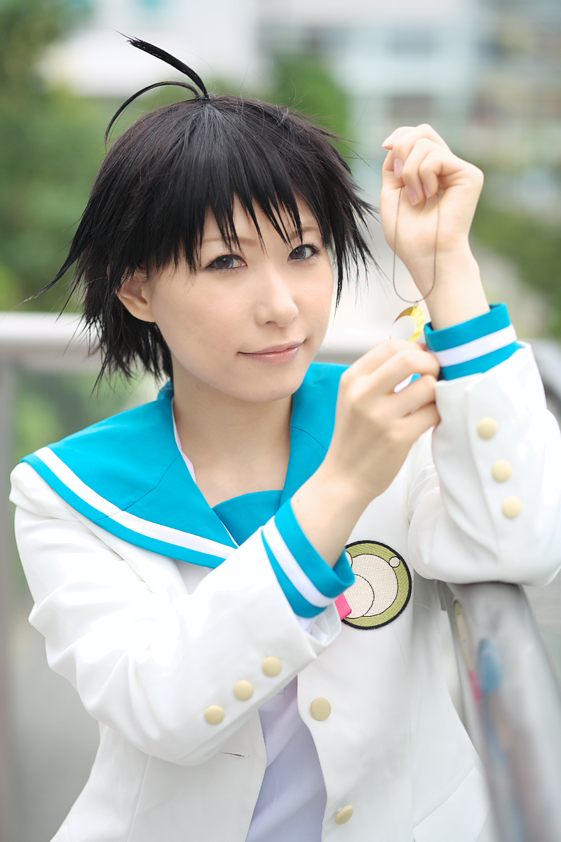 1girl ahoge asian black_hair blue_eyes chippi color_contacts cosplay female_focus highres idolmaster idolmaster_xenoglossia kikuchi_makoto kikuchi_makoto_(cosplay) looking_at_viewer outdoors photo_(medium) school_uniform serafuku short_hair solo
