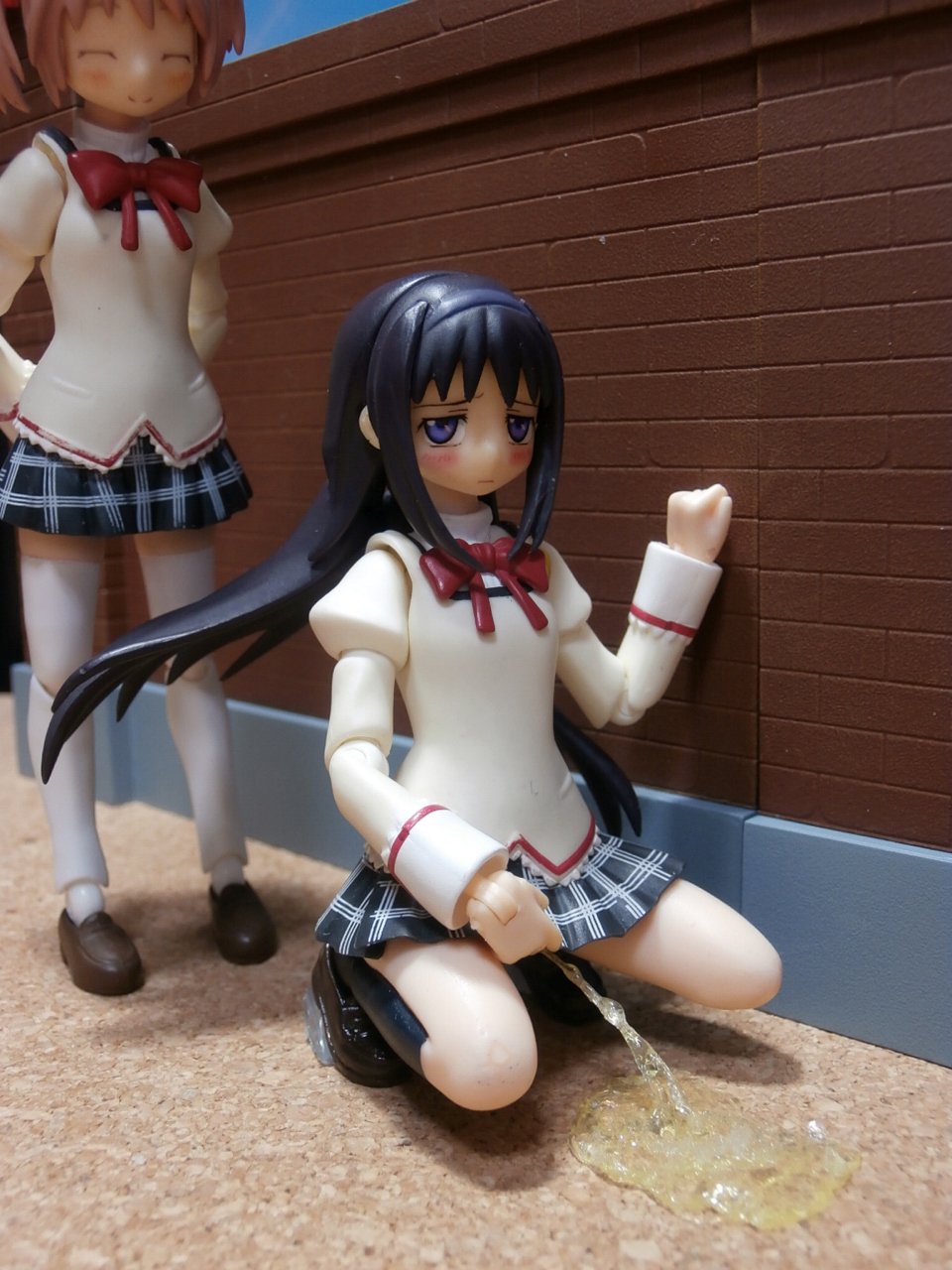 2girls akemi_homura behind_cover black_hair blush bow closed_eyes clothes_lift figma figure highres kaname_madoka kein_(kain1234567) lifting_own_clothes loafers long_hair mahou_shoujo_madoka_magica multiple_girls peeing photo_(medium) pink_hair plaid_clothes plaid_skirt pleated_skirt puddle purple_eyes school_uniform shoes short_hair skirt skirt_lift squatting thighhighs toy twintails white_legwear