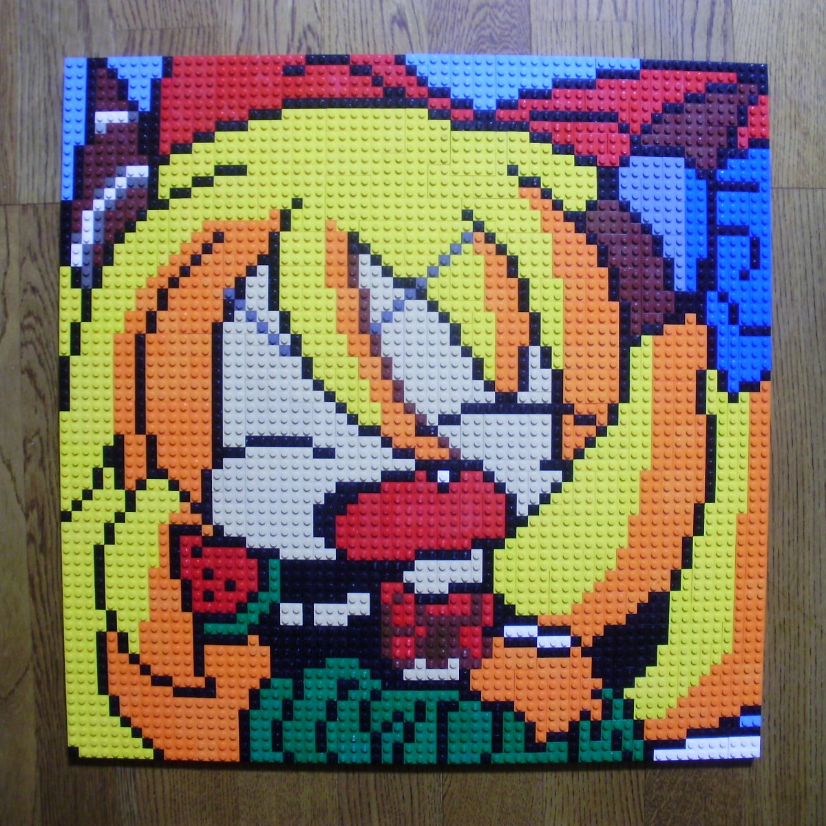 1girl closed_eyes derivative_work fang female_focus food food_print fruit fruit_print highres horn_ornament horn_ribbon horns ibuki_suika lego lego_(medium) orange_hair photo_(medium) pixel_art ribbon solo touhou unconventional_media watermelon watermelon_print you_rei_(blowback)