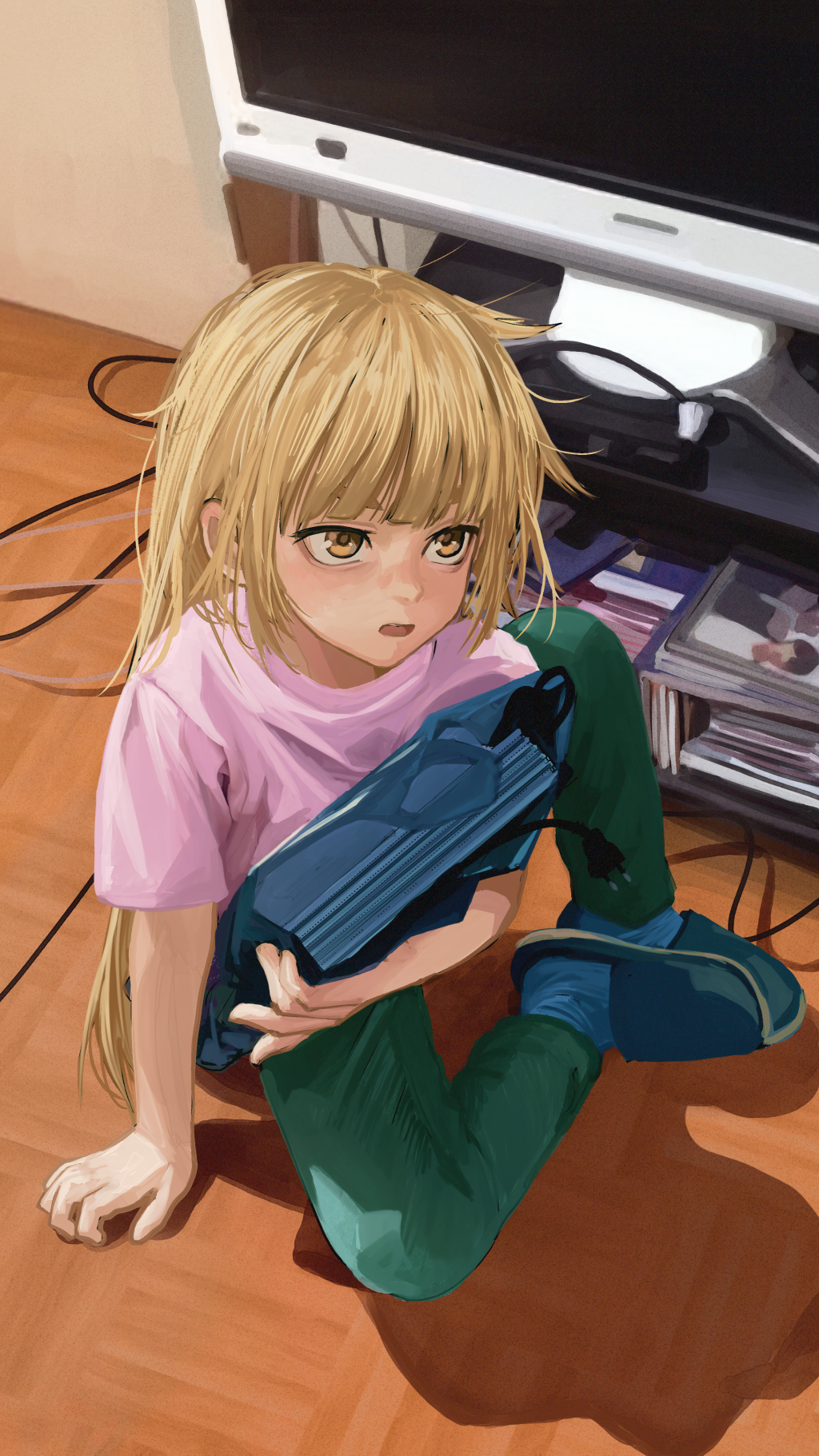 1girl arm_support bag blonde_hair blue_slippers blue_socks cable casual child commentary_request dvd_case from_above green_pants highres holding holding_bag indoors long_hair open_mouth original pants pink_shirt russian_commentary scenery servachok shadow shirt short_sleeves sitting slippers socks solo television videocassette yellow_eyes zhenya_(servachok)