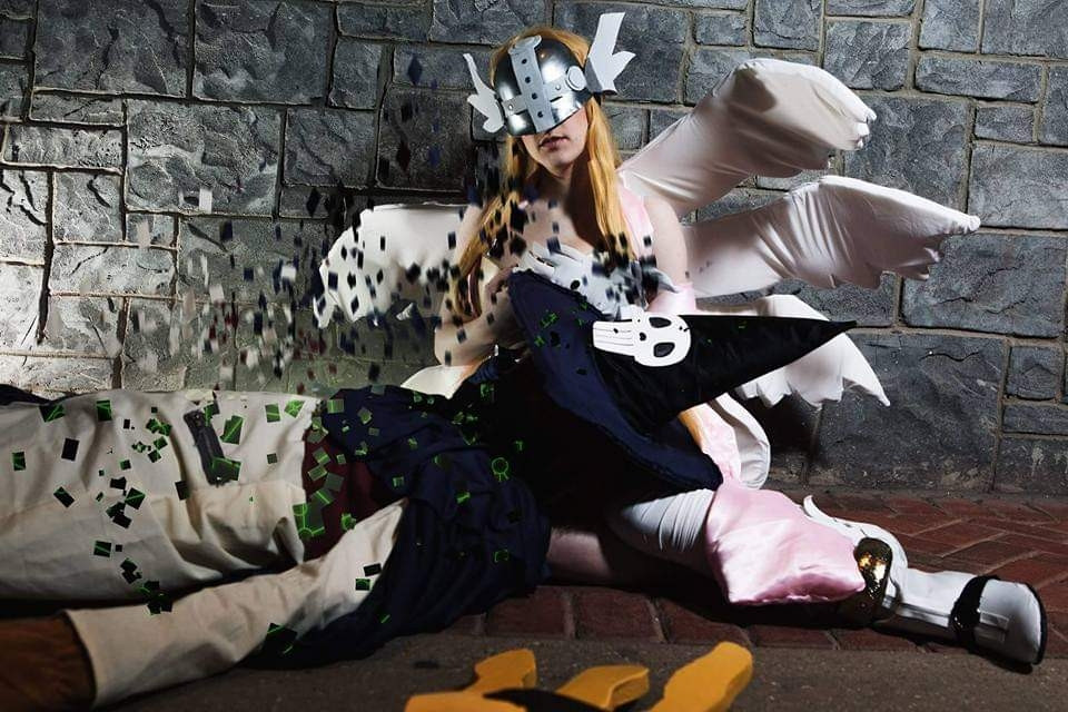 angewomon angewomon_(cosplay) blonde_hair cosplay digimon long_hair mask photo_(medium) real_life wings wizarmon wizarmon_(cosplay)