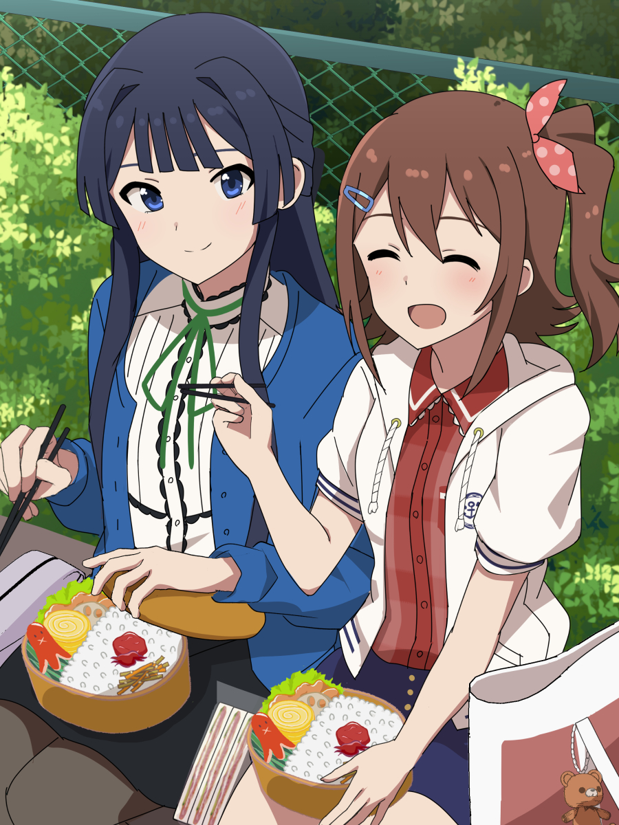 2girls bag bare_legs bear_charm bench bento black_pantyhose black_skirt blue_cardigan blue_eyes blue_skirt blunt_ends blush bow bowtie brown_hair bush cardigan chain-link_fence chopsticks closed_eyes closed_mouth commentary_request cowboy_shot fence food green_bow green_bowtie hair_bow hair_ornament hairclip hand_up highres holding holding_chopsticks hood hoodie idolmaster idolmaster_million_live! idolmaster_million_live!_theater_days kasuga_mirai long_hair mogami_shizuka multiple_girls open_cardigan open_clothes open_hoodie open_mouth outdoors pantyhose plum polka_dot polka_dot_bow red_bow red_shirt rice sandwich sausage shirt side_ponytail sidelocks sitting skirt smile trinitro_t white_hoodie white_shirt
