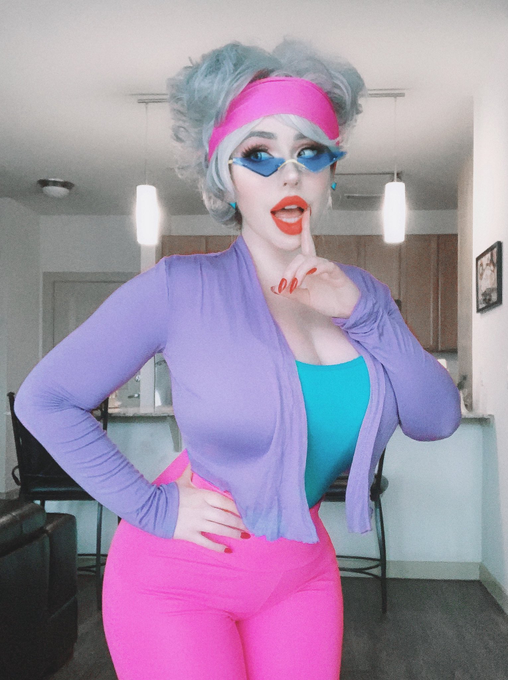 1girl blue-tinted_glasses blush_(makeup) breasts bunny_bravo bunny_bravo_(cosplay) cartoon_network chair cleavage coat cosplay cosplay_photo couch door eyelashes eyeliner eyeshadow female_focus finger_to_mouth glasses green_eyes green_shirt grey_hair hand_on_own_hip hanna-barbera headband johnny_bravo_(series) lamp large_breasts light lips lipstick makeup nail_polish pants photo_(medium) pink_eyeshadow pink_headwear pink_pants png_conversion purple_coat red_lips red_nails shirt short_hair solo source_request tagme thejulietttemichele thick_thighs thighs warner_bros white_wall wide_hips wig