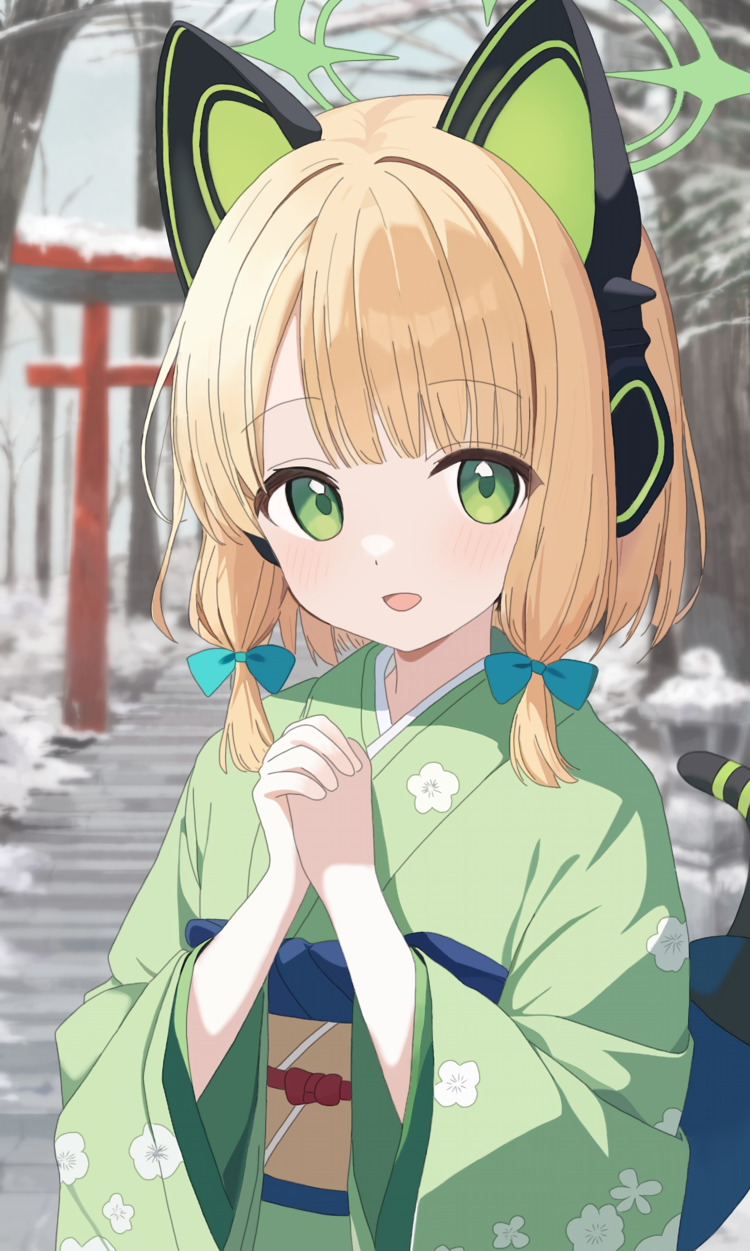 1girl :d absurdres alternate_costume animal_ear_headphones animal_ears blonde_hair blue_archive blue_bow blunt_bangs blurry blurry_background blush bow cat_ear_headphones cat_tail cherry_blossom_print commentary day fake_animal_ears fake_tail floral_print floral_print_kimono green_eyes green_halo green_kimono hair_bow halo happy hatsumoude headphones highres interlocked_fingers japanese_clothes kimono knight1208 long_sleeves looking_at_viewer midori_(blue_archive) new_year open_mouth outdoors own_hands_together print_kimono short_hair sidelighting sidelocks smile snow solo tail tareme torii wide_sleeves winter