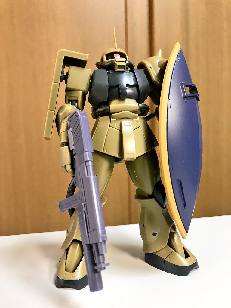 gun gundam gunpla holding holding_gun holding_shield holding_weapon mecha mobile_suit_gundam model_kit model_kit_(medium) no_humans ookawara_kunio photo_(medium) reference_photo robot shield unconventional_media weapon zaku_ii_s