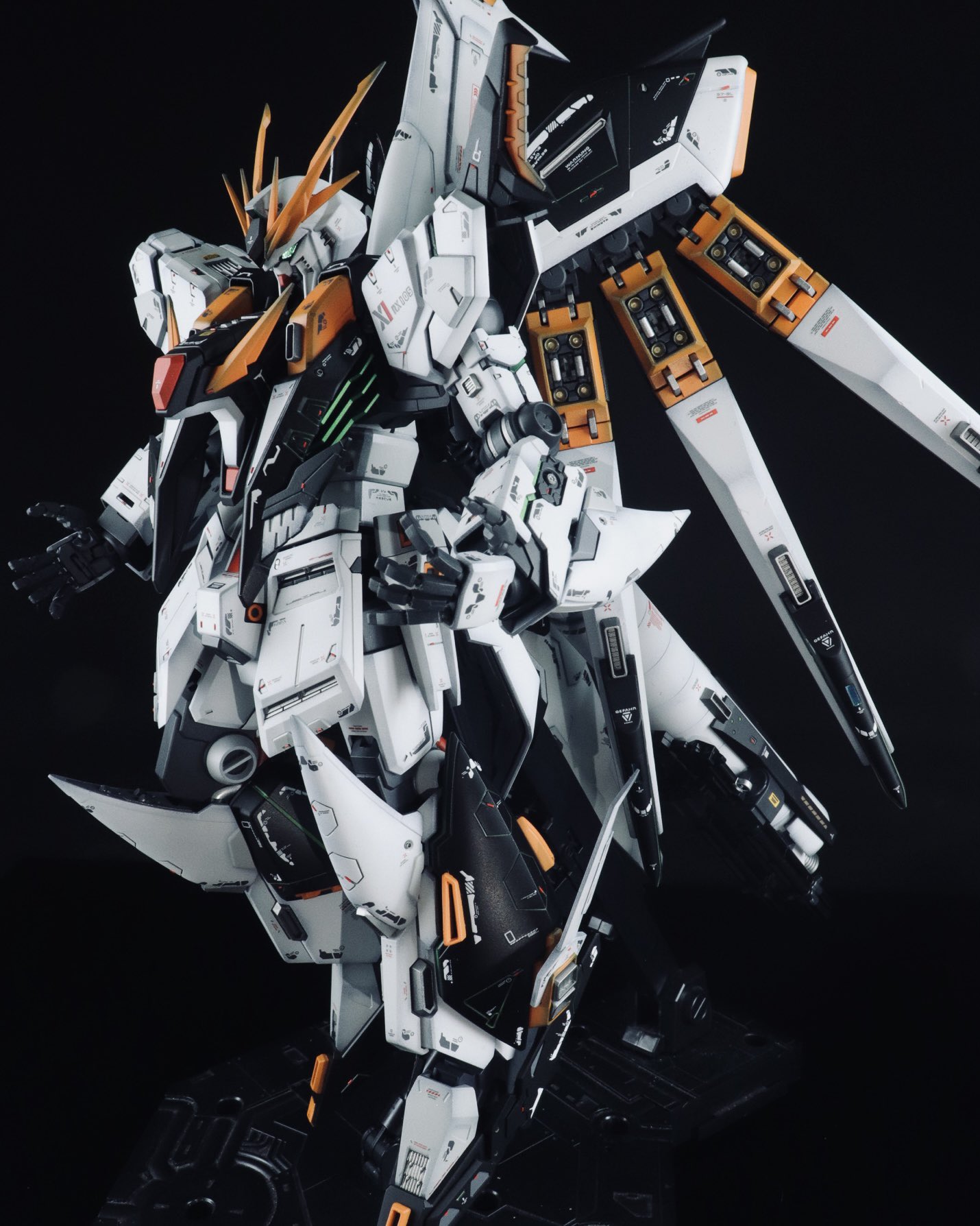 char&#039;s_counterattack fin_funnels fusion green_eyes gundam gundam_hathaway&#039;s_flash gunpla haru_(shun_yakaraj) highres looking_down mecha mobile_suit model_kit model_kit_(medium) no_humans nu_gundam open_hands photo_(medium) robot science_fiction solo unconventional_media v-fin xi_gundam