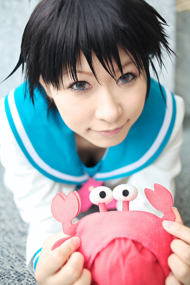 1girl ahoge asian blue_eyes chippi color_contacts cosplay crab female_focus highres idolmaster idolmaster_xenoglossia indoors kikuchi_makoto kikuchi_makoto_(cosplay) looking_at_viewer photo_(medium) school_uniform serafuku short_hair solo stuffed_animal stuffed_toy