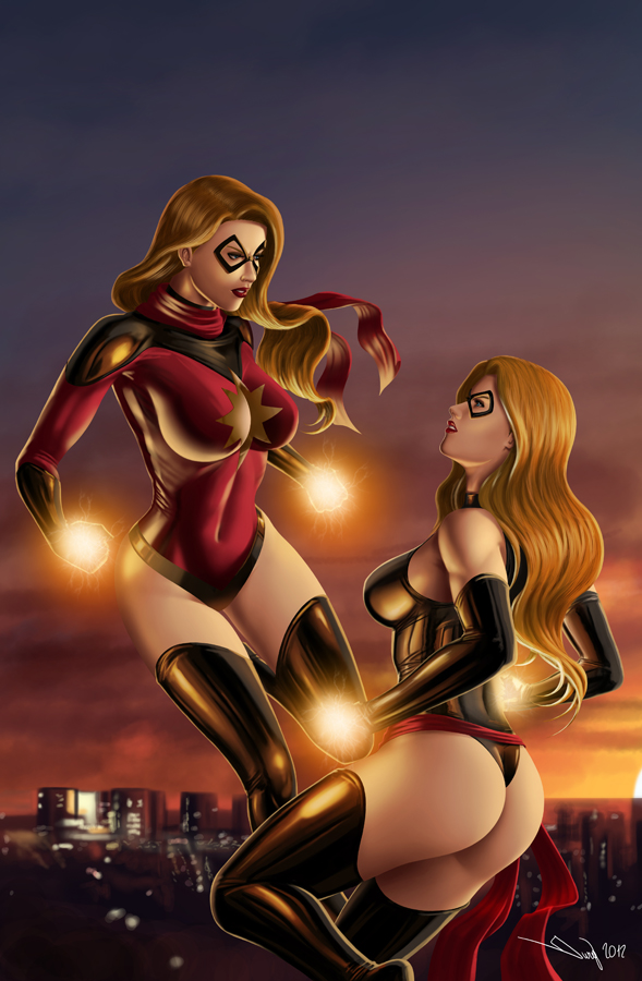 2girls ass black_leotard blonde_hair blue_eyes breasts carol_danvers covered_navel floating glowing iury_padilha karla_sofen large_breasts leotard long_hair marvel mask moonstone_(marvel) ms._marvel ms_marvel multiple_girls red_leotard thighhighs
