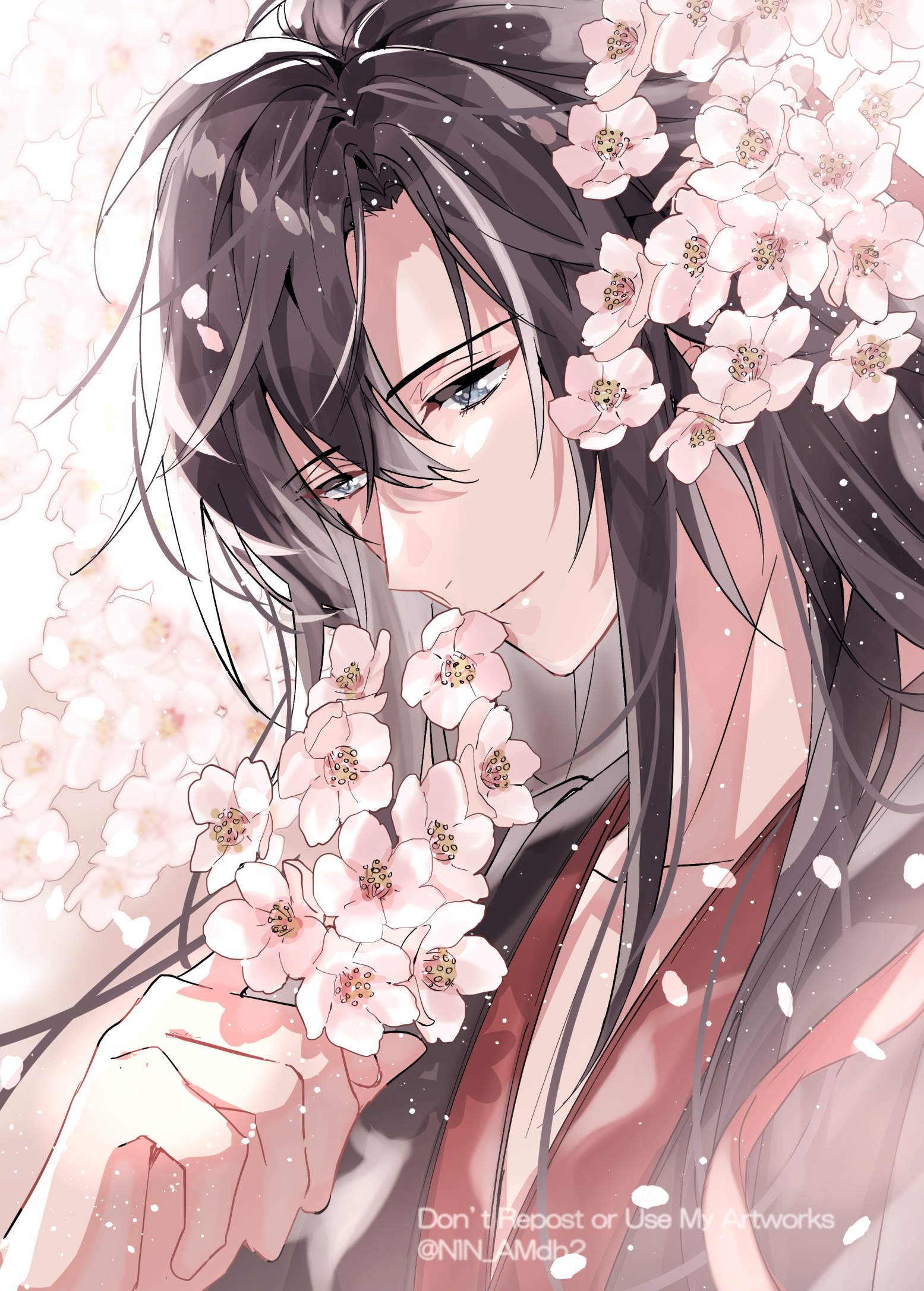 1boy bishounen black_hair black_hanfu cherry_blossoms chinese_clothes closed_mouth english_text falling_petals flower grey_eyes hair_between_eyes hair_down hair_ribbon half_updo hanfu highres holding holding_flower hyottokoane light_particles long_hair looking_down male_focus modao_zushi official_alternate_hairstyle petals pink_flower red_ribbon ribbon smile solo twitter_username upper_body wei_wuxian wei_wuxian_(yiling_laozu)