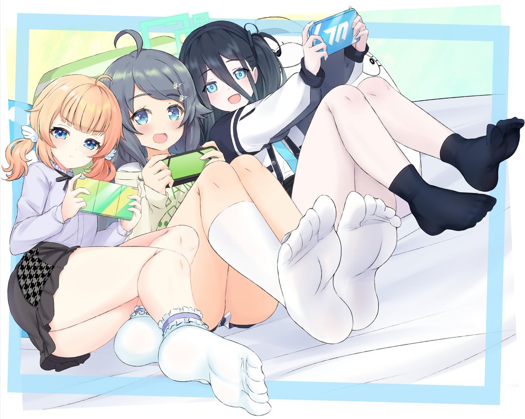 3girls :d ahoge aris_(blue_archive) black_hair blonde_hair blue_archive blue_eyes blush feet girl_sandwich hair_ornament handheld_game_console inohara_koboshi lace lace_legwear long_hair looking_at_viewer lying motosu_towa multiple_girls no_shoes ongeki open_mouth samiko sandwiched school_uniform short_hair skirt smile socks soles toes twintails world_dai_star