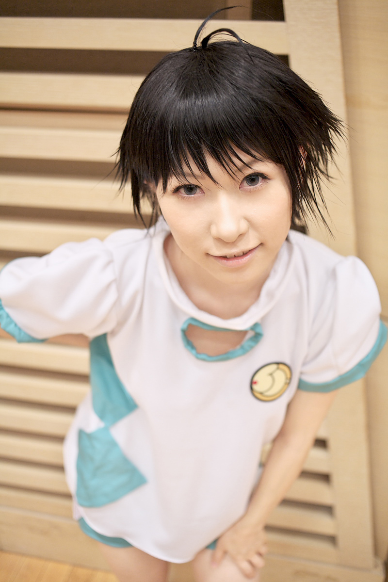 1girl ahoge asian black_hair chippi color_contacts cosplay female_focus highres idolmaster idolmaster_xenoglossia kikuchi_makoto kikuchi_makoto_(cosplay) looking_at_viewer photo_(medium) shirt short_hair shorts solo t-shirt