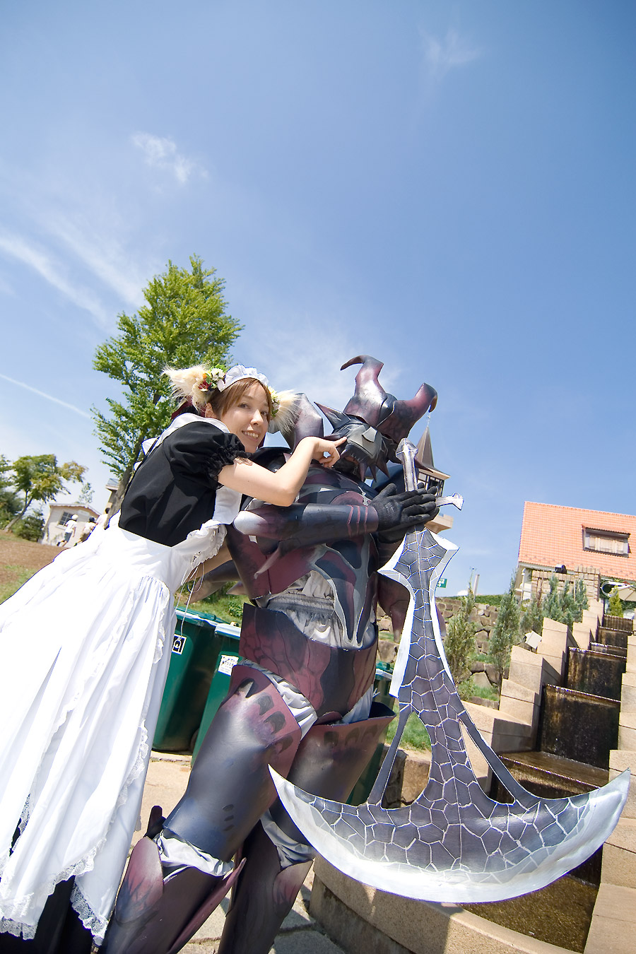animal_ears anya apron armor cosplay dog_ears highres maid maid_apron photo_(medium) sword tray weapon