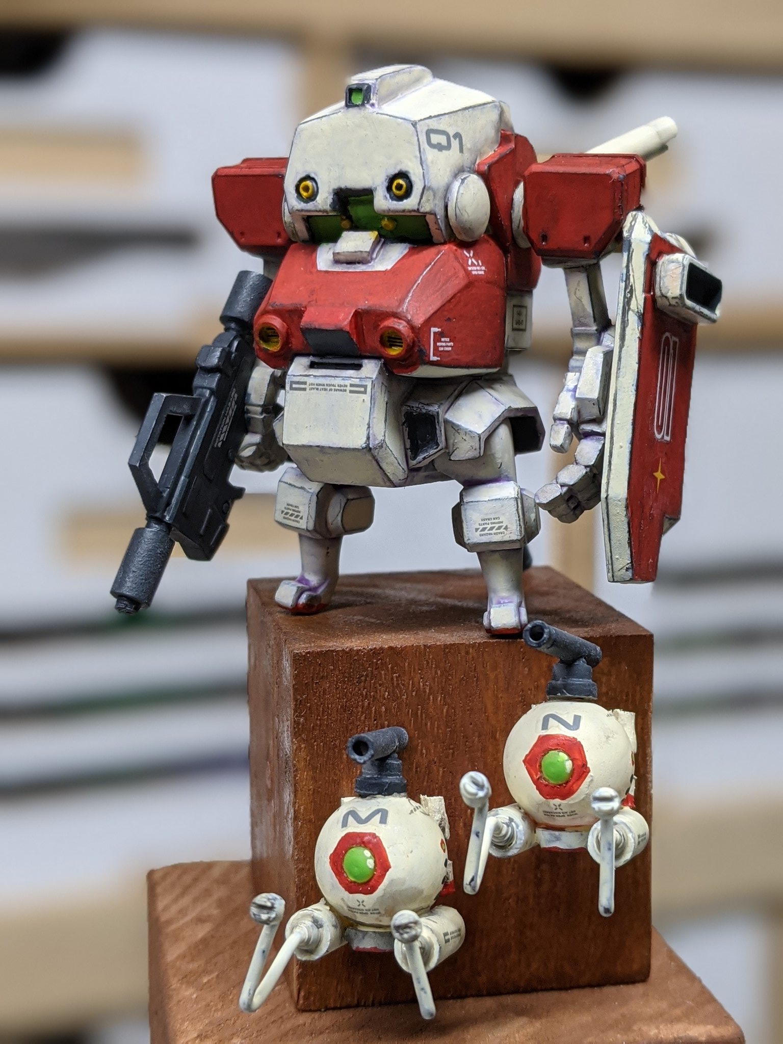 ball_(gundam) cavico_models fusion gm_(mobile_suit) gun gundam highres holding holding_gun holding_weapon jgsdf_type_07_tank_nacchin looking_ahead matage_sanjuro mecha mobile_suit_gundam model_kit model_kit_(medium) no_humans open_hand photo_(medium) robot shield standing turret unconventional_media visor weapon yellow_eyes