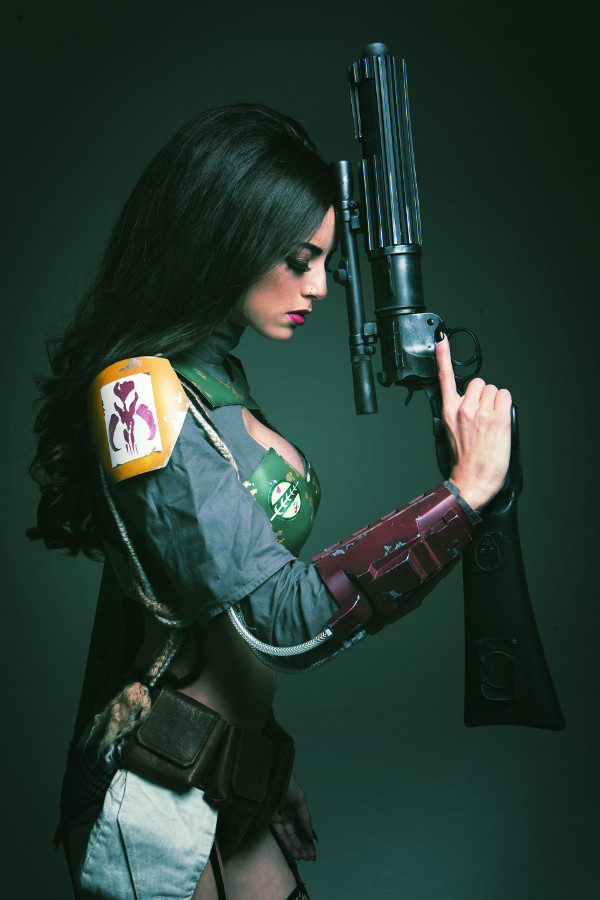 1girl armor black_hair boba_fett boba_fett_(cosplay) cosplay female_focus genderswap genderswap_(mtf) gun nail_polish photo_(medium) solo star_wars tagme weapon