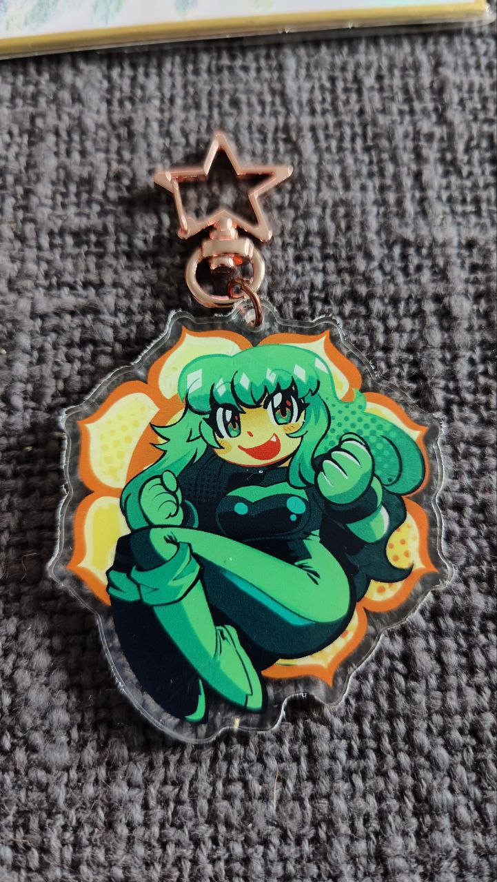 1girl asymmetrical_footwear black_bodysuit black_boots blush bodysuit boots breasts charm_(medium) clenched_hands commentary dori_(zeroranger) english_commentary fang flower full_body gift_art green_bodysuit green_boots green_eyes green_hair green_theme halftone happy highres long_hair looking_at_viewer lotus medium_breasts mismatched_footwear mogy64 multicolored_bodysuit open_mouth orange_theme photo_(medium) second-party_source smile solo star_(symbol) traditional_media two-tone_bodysuit zeroranger