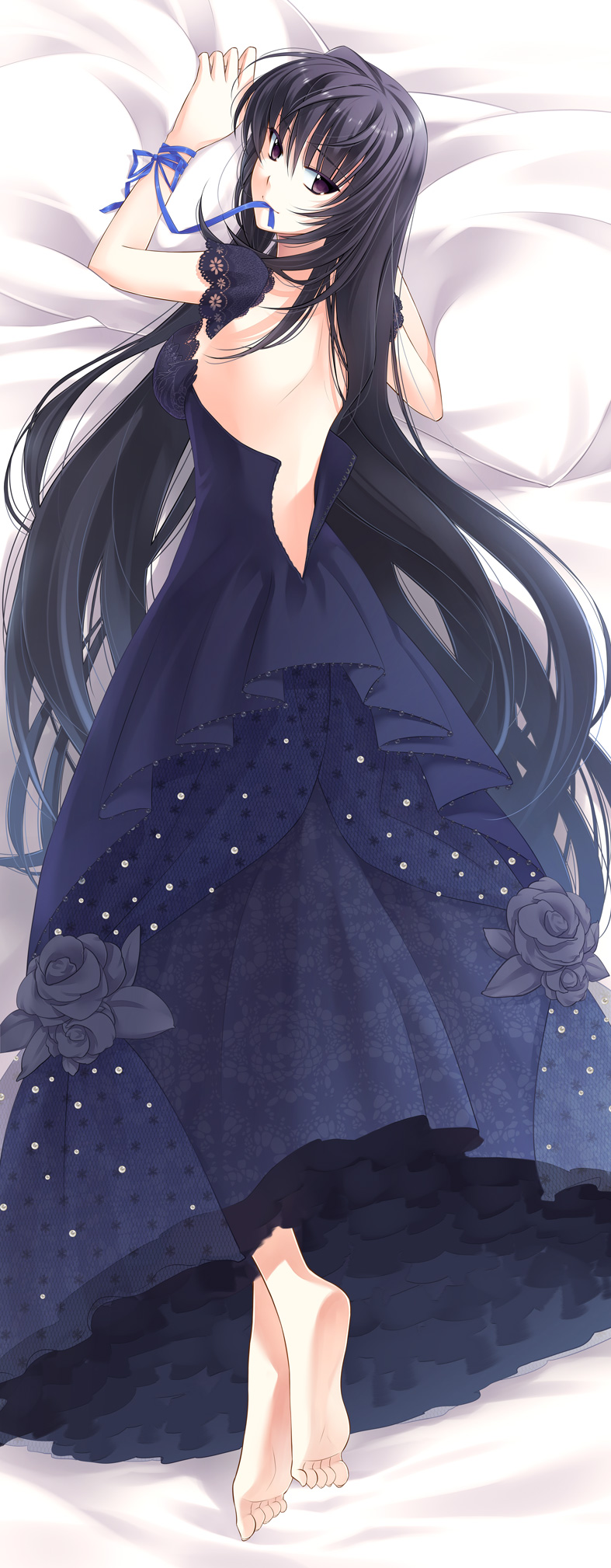 1girl barefoot black_dress black_eyes black_hair blue_ribbon breasts dakimakura_(medium) dress dress_flower ever_17 flower highres komachi_tsugumi looking_at_viewer looking_back lying medium_breasts mouth_hold on_stomach pillow pillow_grab ribbon solo takigawa_yuu wedding_dress