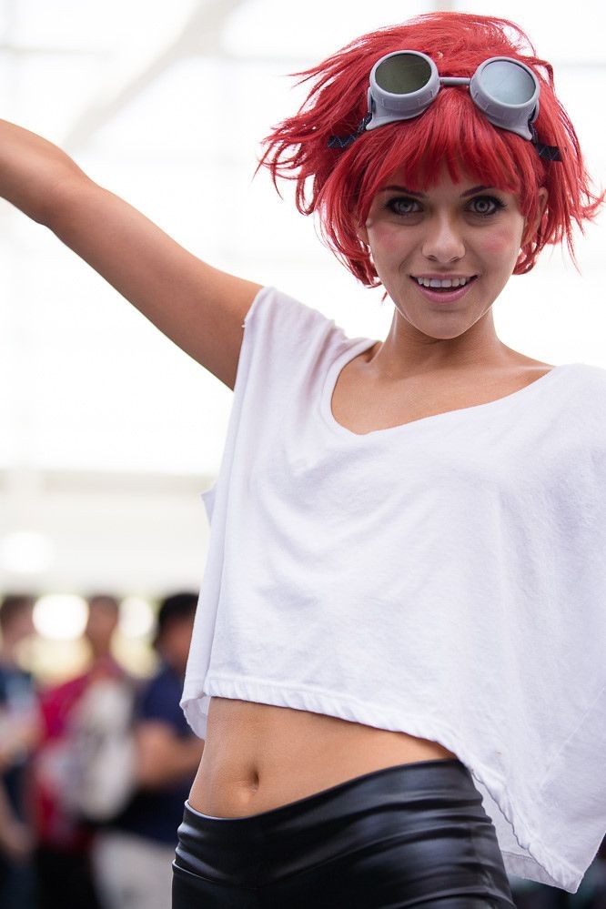 bike_shorts cosplay cowboy_bebop edward_wong_hau_pepelu_tivrusky_iv edward_wong_hau_pepelu_tivrusky_iv_(cosplay) goggles goggles_on_head looking_at_viewer navel photo_(medium) red_hair smile