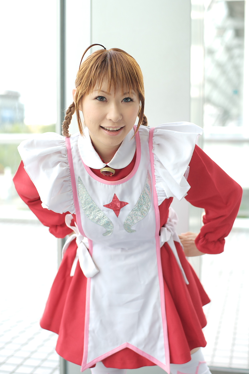1girl ahoge apron arika_yumemiya arika_yumemiya_(cosplay) asian blue_eyes blurry braid chippi color_contacts cosplay depth_of_field female_focus highres indoors long_hair looking_at_viewer maid maid_apron my-otome photo_(medium) school_uniform smile solo twin_braids white_legwear