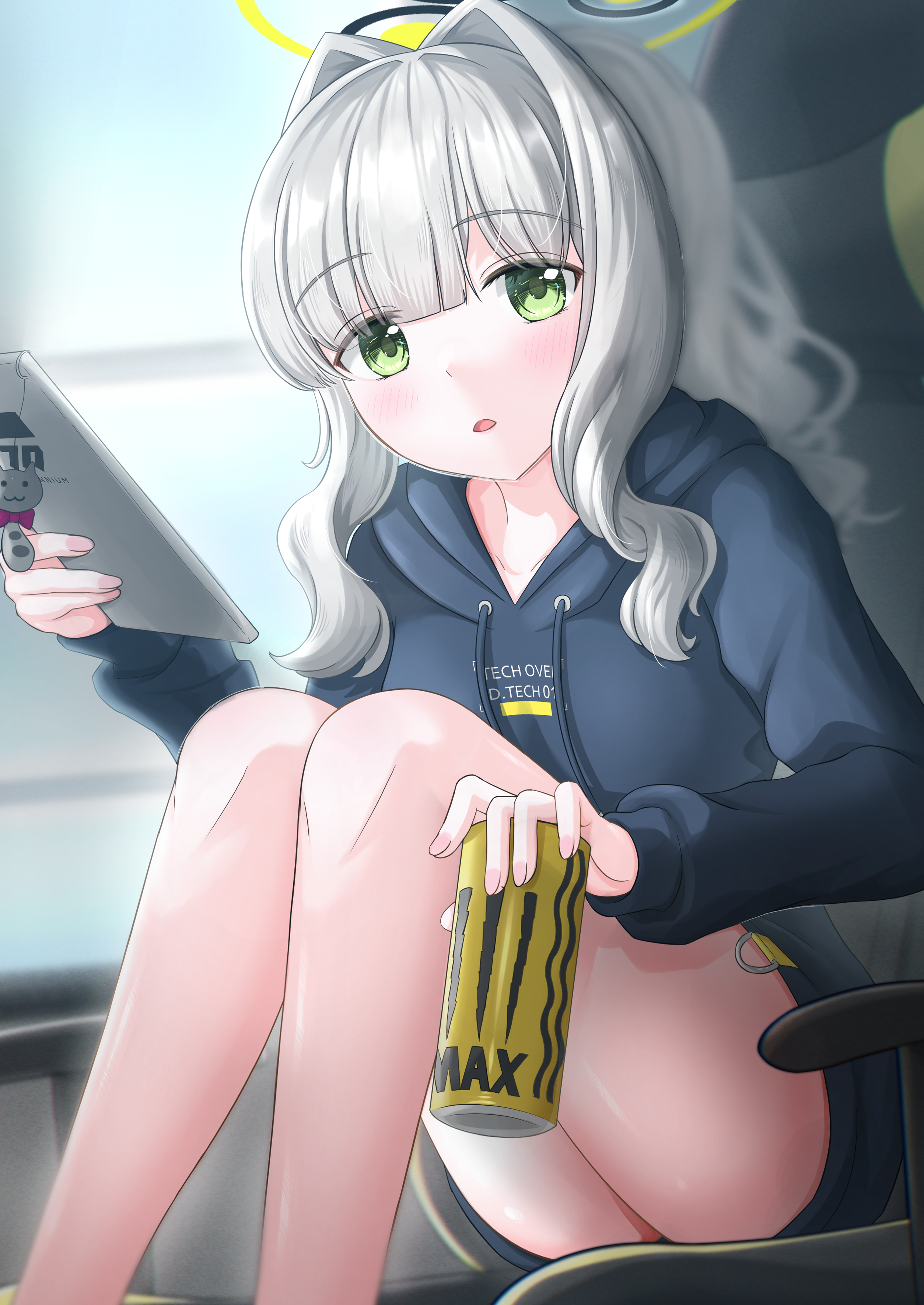 1girl absurdres bare_legs black_hoodie blue_archive blunt_bangs blush can chair commentary_request energy_drink eyes_visible_through_hair feet_out_of_frame fingernails gamel_120 gaming_chair green_eyes grey_hair hair_intakes halo hands_up hare_(blue_archive) highres holding holding_can holding_phone hood hood_down hoodie indoors knees_up long_sleeves looking_at_viewer monster_energy on_chair open_mouth phone ponytail sidelocks sitting solo swivel_chair thighs wavy_hair yellow_halo