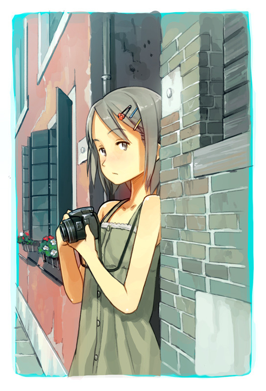 1girl aqua_border border brick_wall building camera camera_around_neck closed_mouth collarbone commentary day drainpipe dress flower green_dress hair_ornament hairclip holding holding_camera looking_at_viewer medium_hair original outdoors planter red_flower sidewalk sleeveless sleeveless_dress solo standing sunlight town white_flower window window_shutter yoshida_seiji