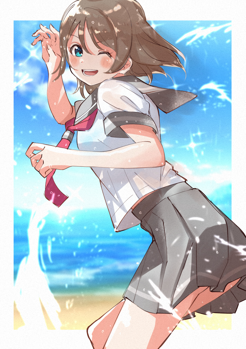 1girl ass beach blue_eyes blush border brown_hair grey_sailor_collar grey_skirt highres love_live! love_live!_sunshine!! neckerchief ocean one_eye_closed pleated_skirt red_neckerchief sailor_collar school_uniform serafuku short_hair skirt skt_(ryxxxxx) smile solo thighs uranohoshi_school_uniform watanabe_you water white_border
