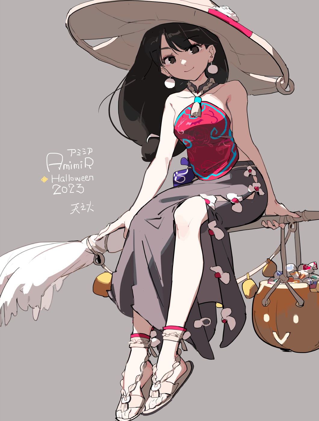 1girl bare_shoulders black_eyes black_hair broom broom_riding candy earrings food grey_background halloween hat highres jewelry long_hair long_skirt looking_at_viewer original sand side_slit simple_background skirt smile solo tennohi witch_hat