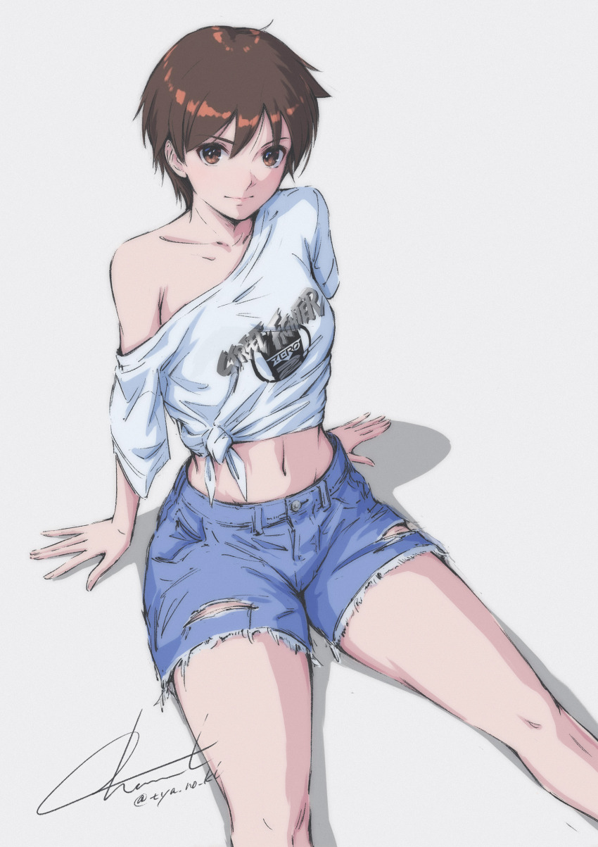 1girl absurdres brown_eyes brown_hair closed_mouth collarbone copyright_name cutoffs denim denim_shorts feet_out_of_frame grey_background highres kasugano_sakura looking_at_viewer midriff navel off_shoulder shadow shirt shorts signature simple_background single_off_shoulder sitting solo street_fighter street_fighter_zero_(series) t-shirt text_print tied_shirt torn_clothes torn_shorts twitter_username tyanoki