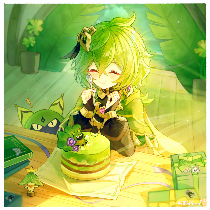 1girl blush book cape capelet closed_eyes closed_mouth collei_(genshin_impact) commentary_request cuilein-anbar_(genshin_impact) double-parted_bangs eating elbow_on_table feather_hair_ornament feathers gem genshin_impact gift green_cape green_hair green_theme hair_between_eyes hair_ornament highres holding holding_spoon leaf mibai_yume pink_gemstone plant potted_plant solo spoon table tassel wooden_floor wooden_table