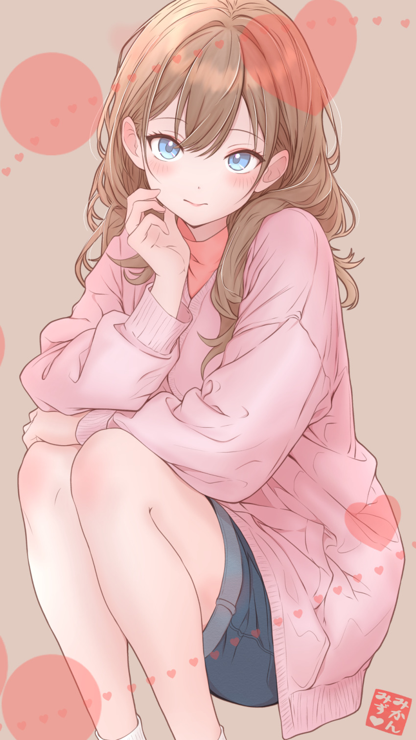 1girl arm_on_knee blue_eyes blue_shorts blush brown_background brown_hair cardigan circle closed_mouth crossed_arms denim denim_shorts dot_nose double-parted_bangs feet_out_of_frame hair_intakes hair_over_shoulder hand_on_own_face heart highres long_hair long_sleeves looking_at_viewer mikan_mizu orange_shirt original pink_cardigan shirt shorts socks squatting turtleneck turtleneck_shirt white_socks
