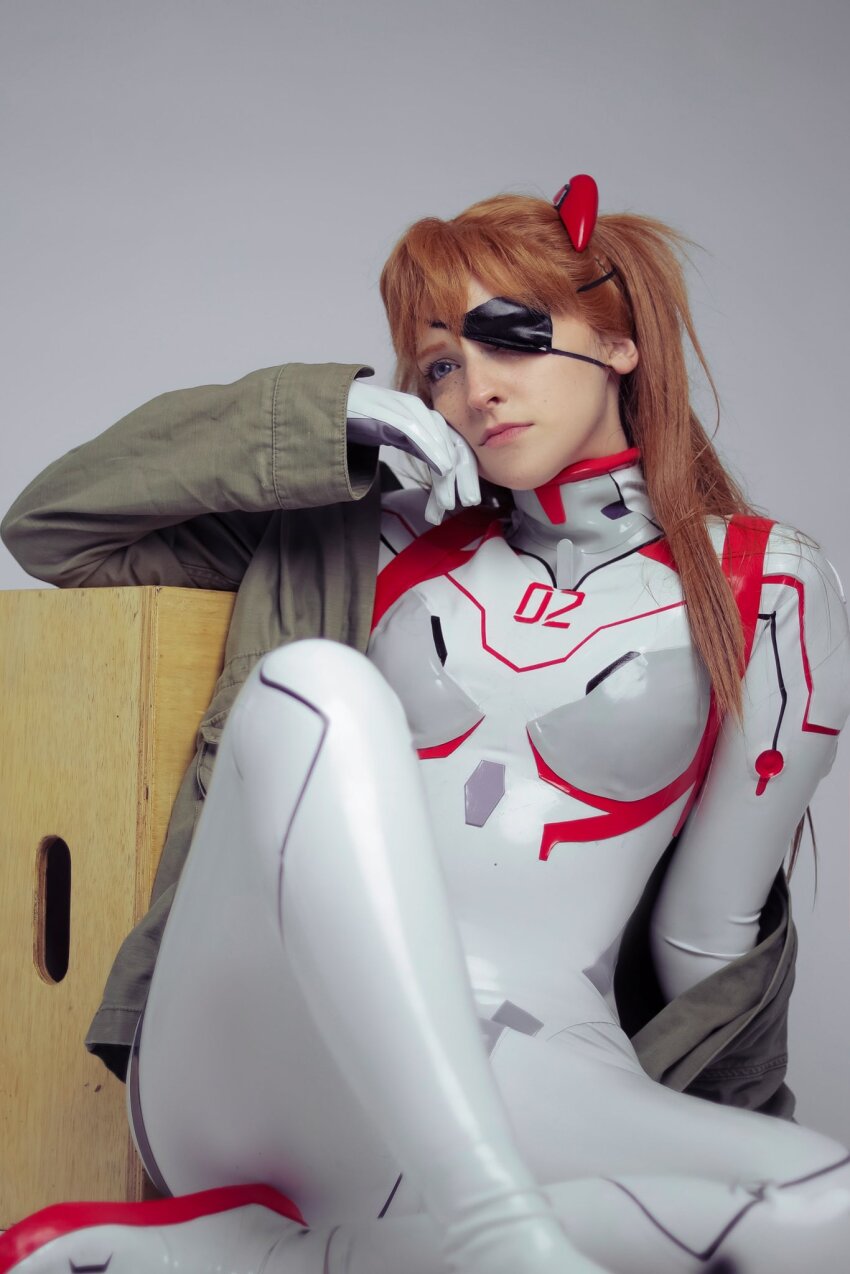 1girl arm_support ass blue_eyes bodysuit brazilian_(nationality) breasts brown_hair cosplay crossed_legs evangelion:_3.0+1.0_thrice_upon_a_time eyepatch freckles green_jacket highres interface_headset_(evangelion) jacket light_smile lips looking_at_viewer mecha_pilot_suit memepantazis neon_genesis_evangelion photo_(medium) plugsuit_(evangelion) rebuild_of_evangelion shiny_clothes solo souryuu_asuka_langley souryuu_asuka_langley_(cosplay) standing twintails two_side_up white_bodysuit