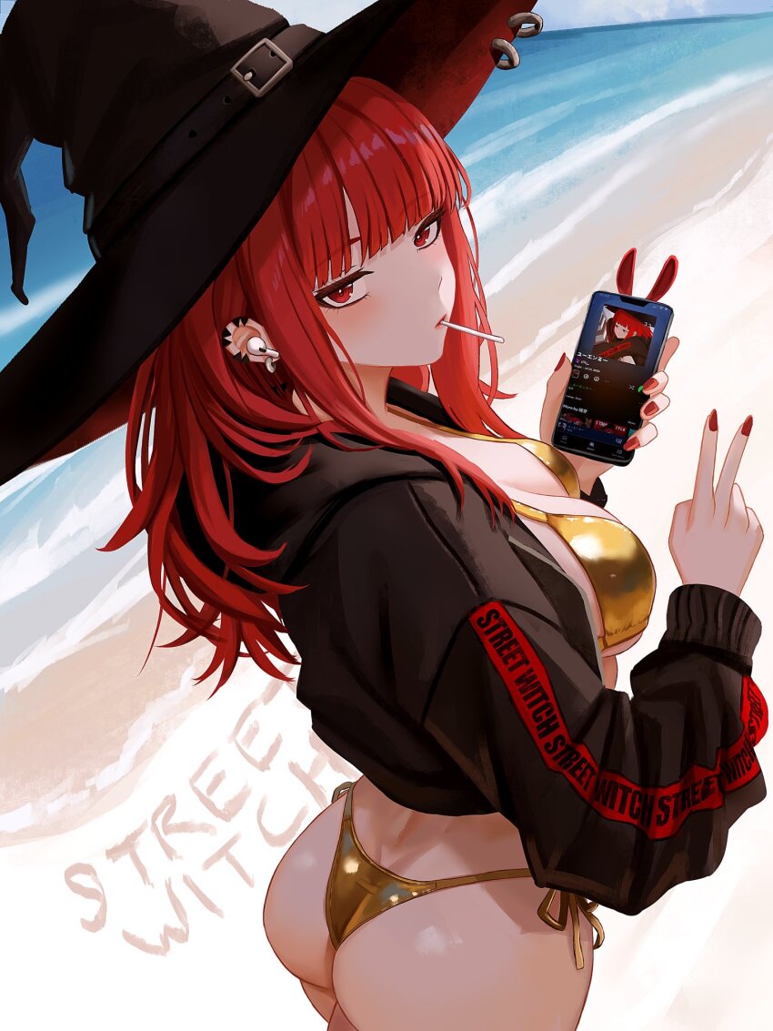 1girl ass beach bikini breasts candy closed_mouth cowboy_shot day ear_piercing english_text food from_behind gold_bikini hat highres holding holding_phone large_breasts lollipop long_hair long_sleeves looking_at_viewer looking_back original outdoors phone piercing red_eyes red_hair solo standing swimsuit v val_(yan_kodiac) witch_hat yan_kodiac