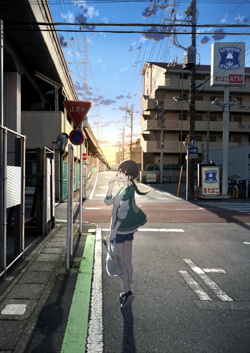1girl :d absurdres anyotete bag black_hair cityscape cloud evening food highres holding holding_food holding_popsicle jacket lawson letterman_jacket looking_at_viewer looking_back open_mouth original plastic_bag ponytail popsicle power_lines road_sign scenery short_shorts shorts sign sky smile solo sunset