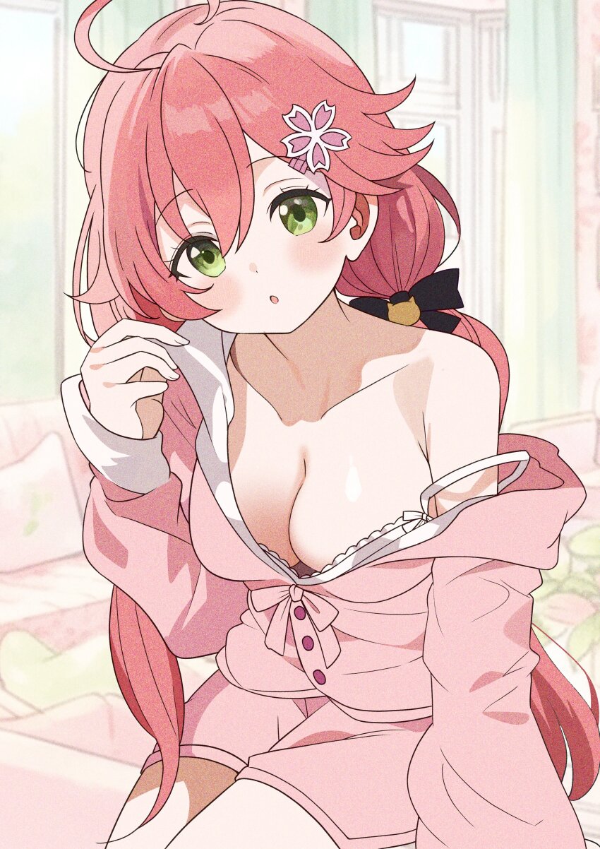 1girl :o absurdres ahoge alternate_costume bell black_bow blurry blurry_background bow breasts cleavage double-parted_bangs green_eyes hair_bell hair_between_eyes hair_bow hair_ornament hand_up highres hololive hutaba_haru indoors long_hair long_sleeves looking_at_viewer loungewear low_twintails medium_breasts official_alternate_hairstyle open_mouth pink_hair pink_shirt pink_shorts sakura_miko shirt short_shorts shorts single_bare_shoulder single_off_shoulder sitting solo strap_slip twintails virtual_youtuber