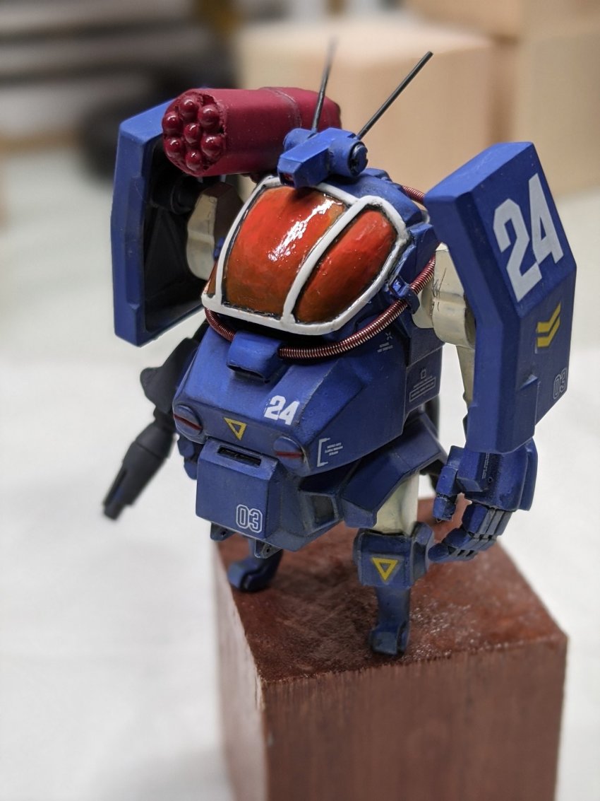 block_(object) cavico_models dougram from_above fusion gun highres holding holding_gun holding_weapon jgsdf_type_07_tank_nacchin matage_sanjuro mecha model_kit model_kit_(medium) no_humans open_hand photo_(medium) robot shoulder_cannon standing taiyou_no_kiba_dougram unconventional_media weapon wood