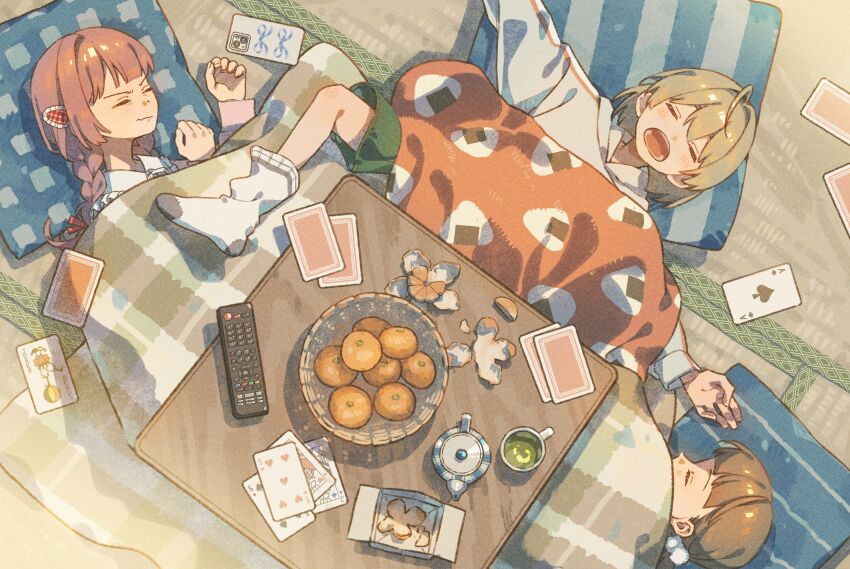 3girls absurdres annoyed ayumi blanket blonde_hair braid brown_hair card cellphone closed_eyes closed_mouth controller cup cushion food food_print fruit green_shorts green_tea hair_ornament highres kotatsu lying mandarin_orange multiple_girls on_back on_side onigiri_print open_mouth orange_peel original phone pink_hair playing_card pom_pom_(clothes) pom_pom_hair_ornament remote_control shorts sleeping smartphone socks table tea teapot twin_braids under_kotatsu under_table