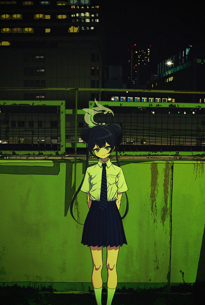 1girl against_wall arms_behind_back black_hair black_skirt blue_archive breast_pocket building city city_lights closed_mouth collared_shirt double_bun fence green_light grey_eyes hair_bun halo highres kisaki_(blue_archive) kisaki_(school_uniform)_(blue_archive) long_hair looking_at_viewer necktie night nkymyura outdoors pocket school_uniform shirt shirt_tucked_in short_sleeves skirt smile socks solo standing striped_necktie urban white_shirt white_socks