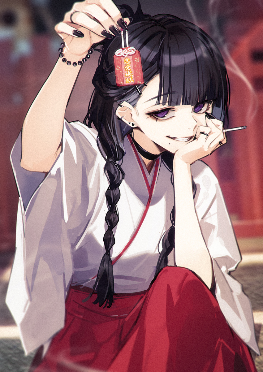 1girl black_hair black_nails blurry blurry_background braid choker cigarette commentary ear_piercing fuyuno_yuuki grin hakama highres holding japanese_clothes jewelry long_hair miko mole mole_under_mouth nail_polish omamori original piercing purple_eyes ring smile solo twin_braids