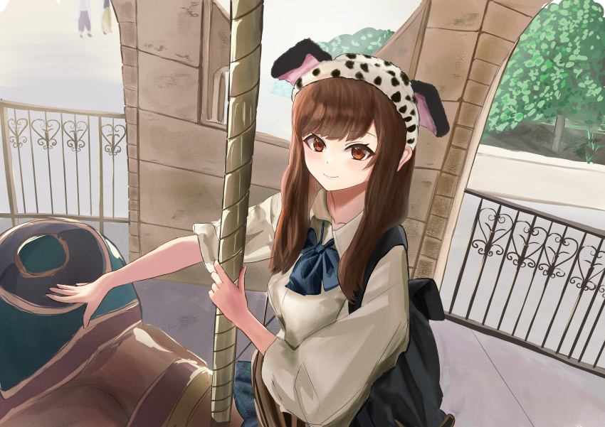 1girl absurdres animal_ears animal_hat backpack bag black_bag blue_bow bow brown_eyes brown_hair carousel closed_mouth collarbone commentary dalmatian_print day disneyland dog_ears fake_animal_ears fence hat highres holding holding_pole iron_fence ky00 long_hair long_sidelocks looking_at_viewer people planter pole real_life riding sailor_collar school_uniform shirt sidelocks smile solo stone_wall sunlight tanaka_minami_(voice_actor) tree upper_body white_sailor_collar white_shirt